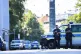 Police officers block a street after police fired shots at a