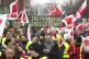 Participants in a Ver.di demonstration walk through the city