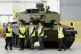 Defence Secretary (left) during a visit to view the first pr