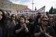 People take part in a rally organised by the association of 