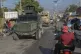 Kenyan police patrol in vehicles through Delmas in Port-au-P