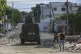 An armoured police vehicle patrols in Port-au-Prince, Haiti,