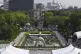 Doves fly over the cenotaph dedicated to the victims of the 