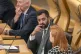 Former first minister Humza Yousaf on the back benches in th