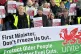Unite Wales members demonstrate outside the Senedd against t