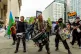 People take part in a ‘wall of sound’ protest at the Tor