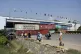 Shipping containers placed by authorities block a key highwa
