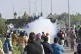 Police fire tear gas to disperse protesting farmers who were