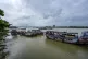 Boats are moored on Hooghly River after ferry services were 