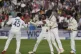 India's Mdohammed Siraj, second left is congratulated by tea