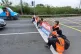 Insulate Britain activists block a road during a protest 