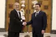 Iranian President Masoud Pezeshkian (left) and Iraqi Prime M