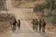 Israeli soldiers are seen near the Gaza Strip border, June 1