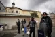 Turkish police officers stand guard in a cordoned off area o