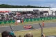 Just Stop Oil activists sit on the racetrack at Silverstone,