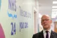 First Minister John Swinney during his visit to NHS 24 call 
