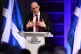 First Minister John Swinney giving a speech at Playfair Libr