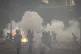Police officers fire tear gas during a protest in Nairobi, K