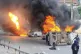 Vehicles set on fire by protesters in Mombasa, Kenya, July 2