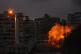 Thick smoke and flames erupt from an Israeli airstrike in Ta