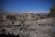 Damaged vehicles seen in front of the Roman temples of Baalb