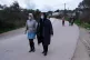 Refugees wearing face masks on the edges of Lesbos's notorio