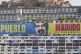 A campaign banner promotes President Nicolas Maduro in Carac