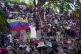 Government supporters rally in defence of President Nicolas 