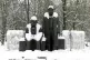 A Marx and Engles statue covered in snow
