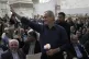 Iran's President-elect Masoud Pezeshkian waves to his suppor