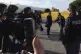 Italy's deputy premier, Matteo Salvini, shakes hands with a 