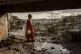 A young girl walks in the Kaweni slum on the outskirts of Ma