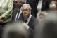 France's Prime Minister Michel Barnier adjust his tie prior 