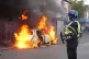 A car burns on Parliament Road, in Middlesbrough, during an 