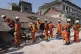 Myanmar's rescuers work through rubble of a collapsed buildi