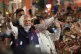 Indian Prime Minister Narendra Modi greets supporters as he 