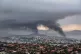 Smoke rises during protests in Noumea, New Caledonia, May 15