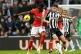 Luton Town's Elijah Adebayo (left) and Newcastle United's Le