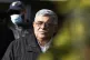Golden Dawn party leader Nikolaos Michaloliakos, escorted by
