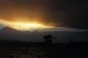 The sun sets over Hunterston Terminal, a coal-handling port 