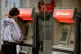 A Santander cashpoint outside a branch in Victoria, central 