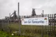 A Unite union banner on the fence outside the Tata steel pla