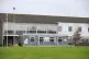 An exterior view of the visitors' centre at HMP Coldingley