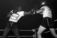 MISUNDERSTOOD: Sonny Liston (left) takes a shot at a sparrin