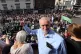 Then Labour leader Jeremy Corbyn watches the parade from the