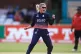 England's Alex Hartley celebrates the wicket of New Zealand'