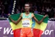 Ethiopia's Yomif Kejelcha celebrates winning gold in the Men