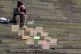 A homeless man sits on the steps of Liverpool Central Librar