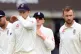 Joe Root leads his team off during the first Test against Pa