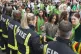 People thank firefighters during a silent walk by Grenfell T